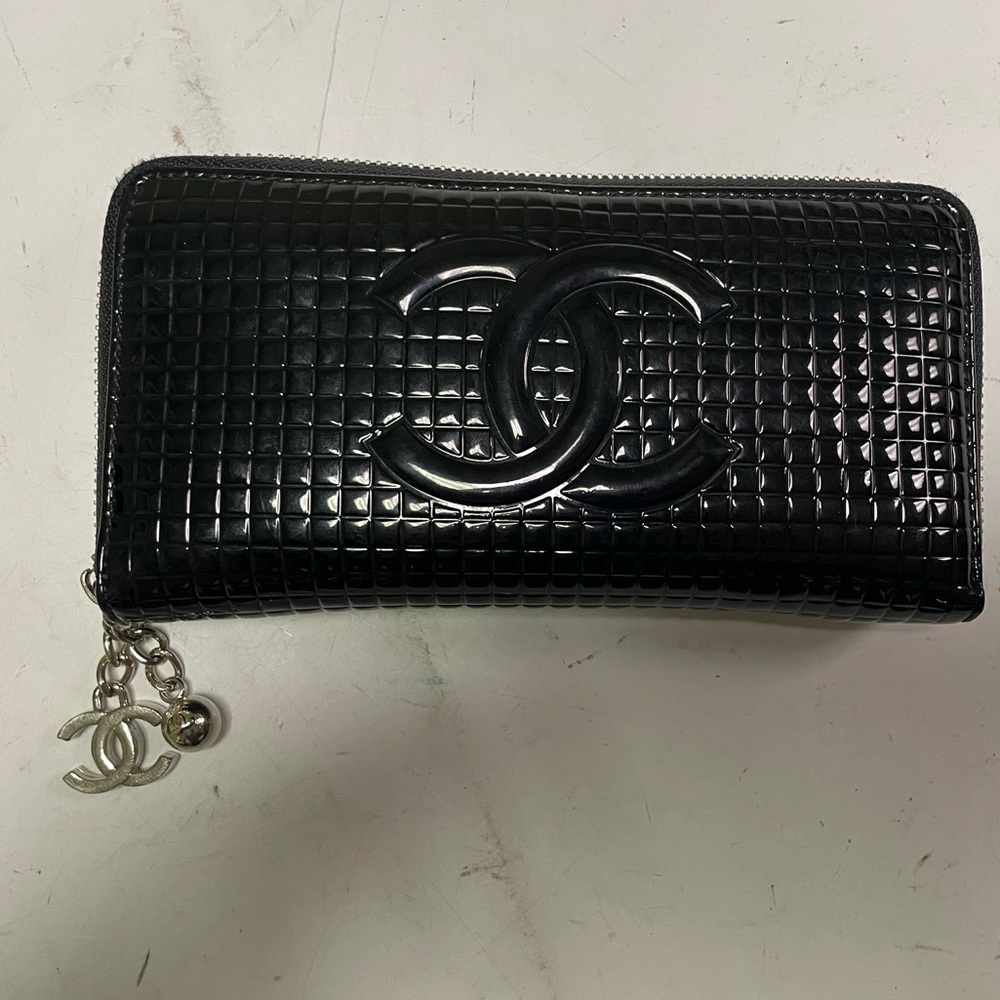 Authentic Chanel zip around wallet black patent leather France